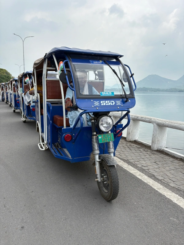 Women driving colorful electric rickshaws in Jaipur and Rajasthan – social enterprise for sustainable tourism.